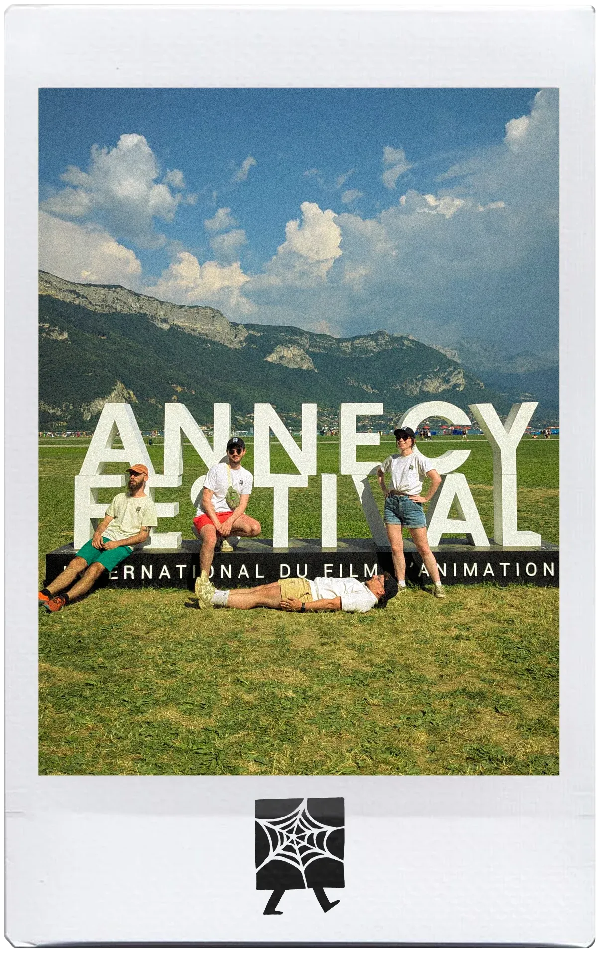Chloé, Flavien, Steven and Dorian in front of the Annecy festival sign
