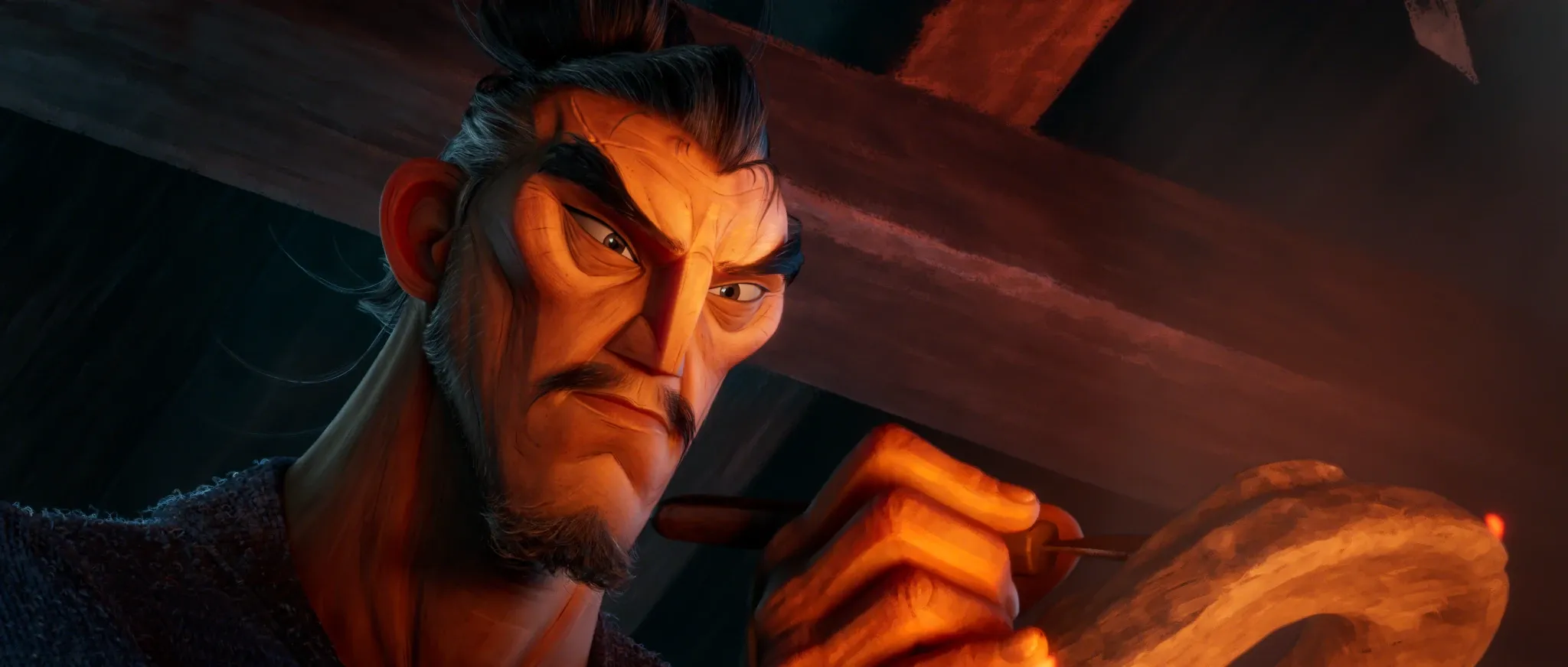 Tengu no Uta — Hisashi at his carving knife, his face lit orange by the fire